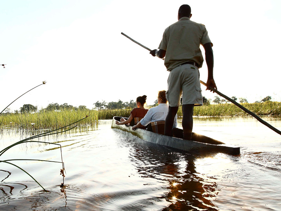 Canoe-Trip-with-traditional-mokoro-boat-on-the-river-through-Okavango-Delta